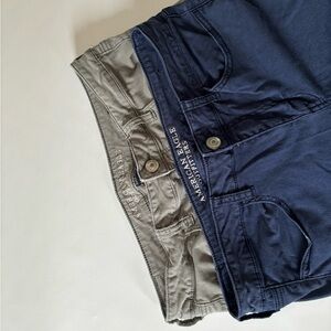 2 pairs of size 12 American Eagle sateen jeggings. Navy and gray-green jeans